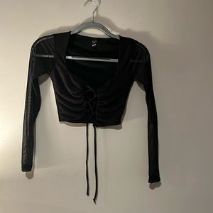 Black lace up top with mesh sleeves